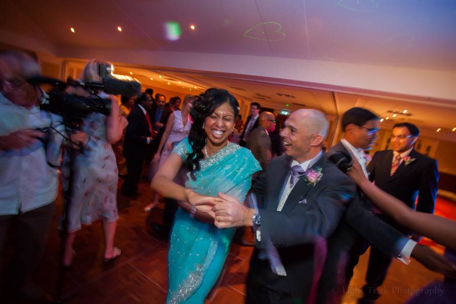 bride dancing disco with best man